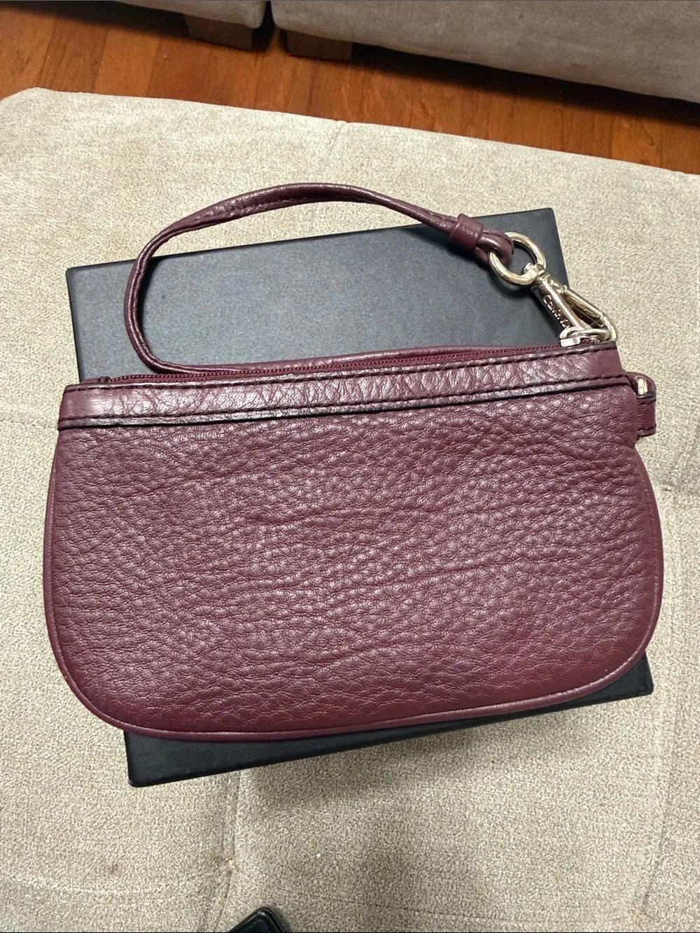 Calvin Klein Burgundy Leather Wristlet Clutch with Gold Accents